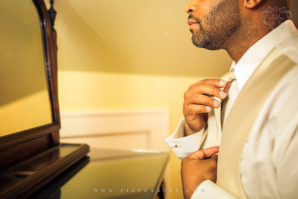 Groom Getting Ready Photo at Legare Waring House, Charleston, SC. Photo by Wedding Photographer in Charleston, Fia Forever.