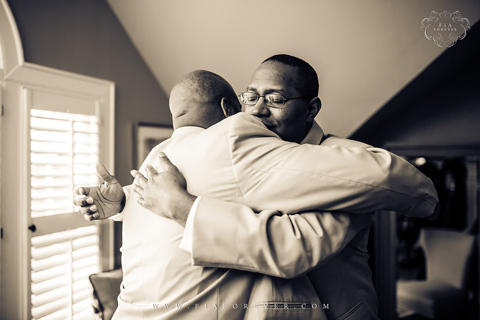 Groom and brother emotional moment at Legare Waring House, Charleston, SC. Photo by Wedding Photographer in Charleston, Fia Forever.