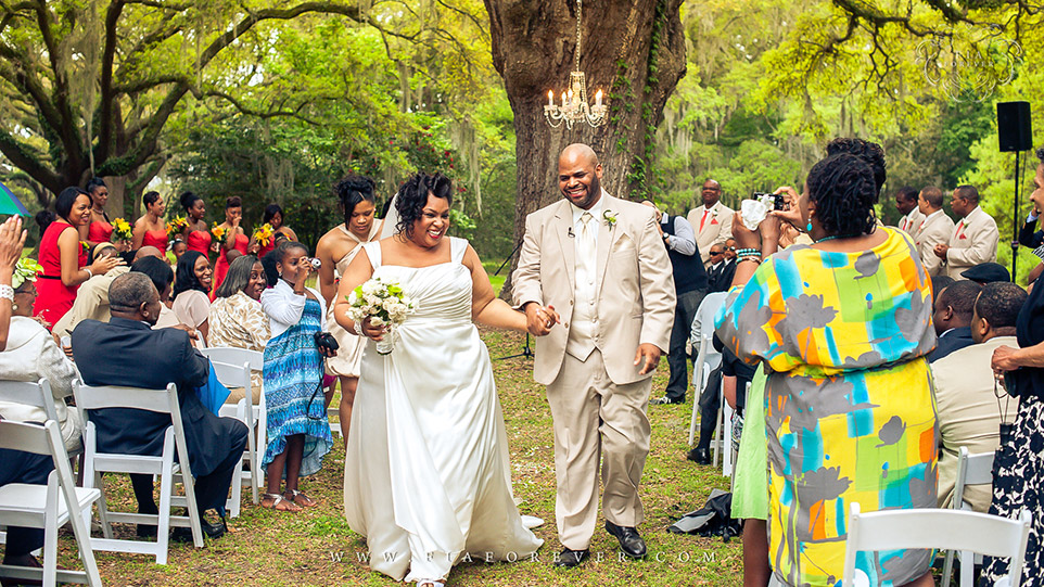 Happily Married at Legare Waring House, Charleston, SC. Photograph by Charleston Wedding Photographer Fia Forever.