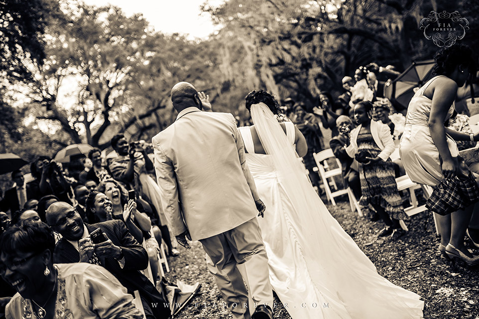 Happily Married at Legare Waring House, Charleston, SC. Photograph by Charleston Wedding Photographer Fia Forever.