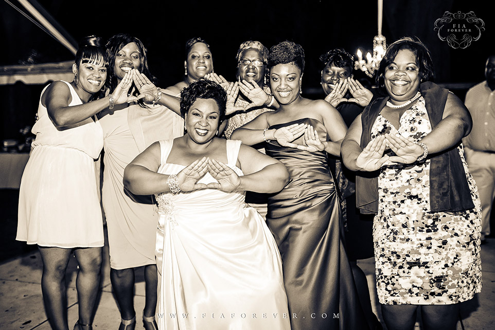 Delta Sigma Theta Sorority Sisters on dance floor at Legare Waring House, Charleston, SC. Photograph by Charleston Wedding Photographer Fia Forever.