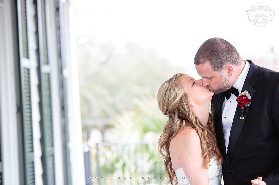 Passionate Kiss after First Look Lowndes Grove Plantation WeddingPhoto by Charleston Wedding Photographers Fia Forever