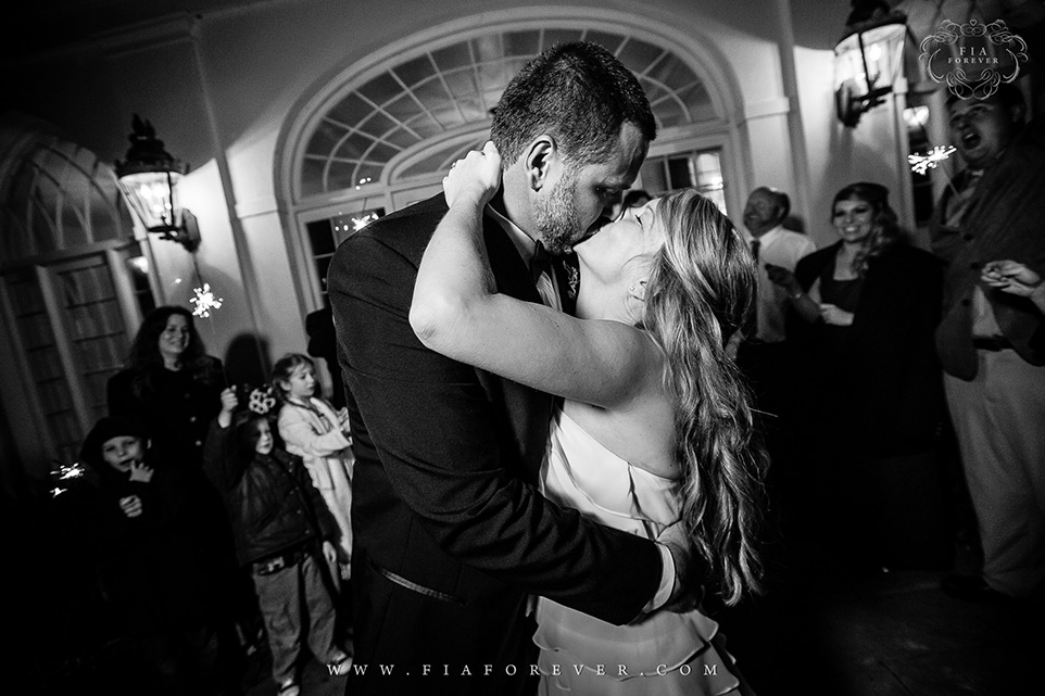 Bride Groom Exit and kiss Lowndes Grove Plantation Wedding Photo by Wedding Photographers in Charleston Fia Forever