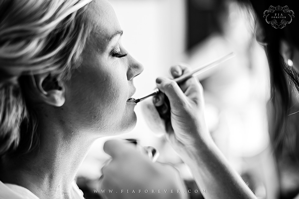 Bride-getting-ready-getting-makeup-done-photo-by-wedding-photographers-charleston-sc-Fia-Forever