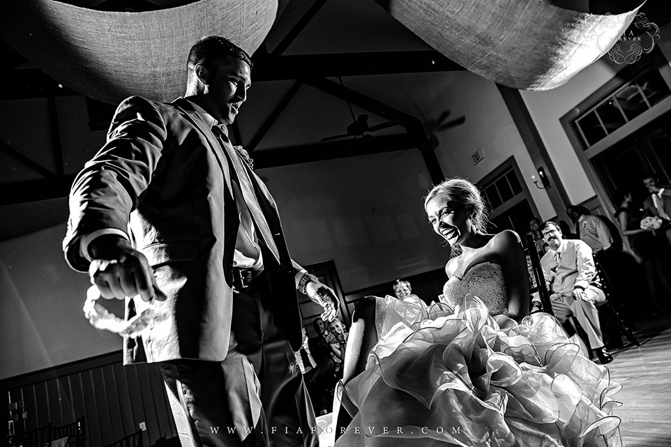Reception-and-Dancing-Garter-photo-by-wedding-photographers-charleston-sc-Fia-Forever